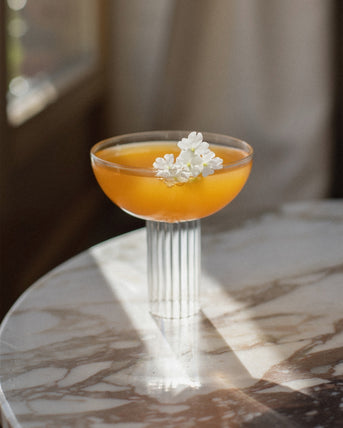 Recette bellini cocktail apéritif sans alcool prosecco martini ingrédients purée nectar de pêche blanches fruitée rosée 